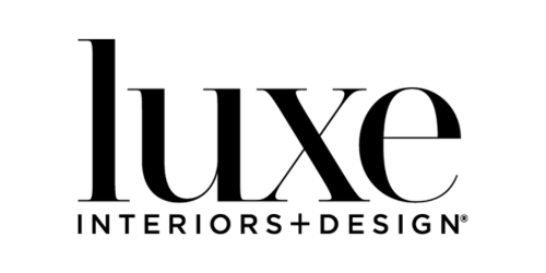 Minimalist lowercase "luxe" logo with "Interiors + Design" subtitle in black.